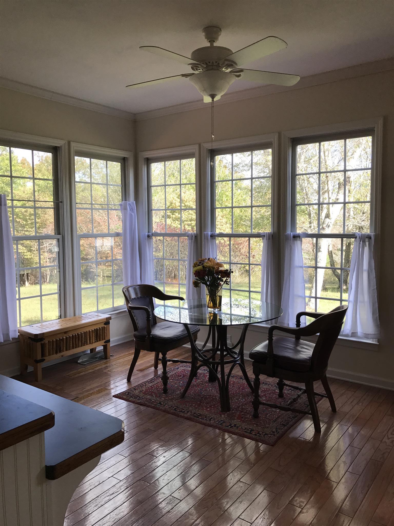 1267 Hillcrest Road Dickson, TN 37055 - Photo 9 of 24 a view of a dining room with furniture window and outside view