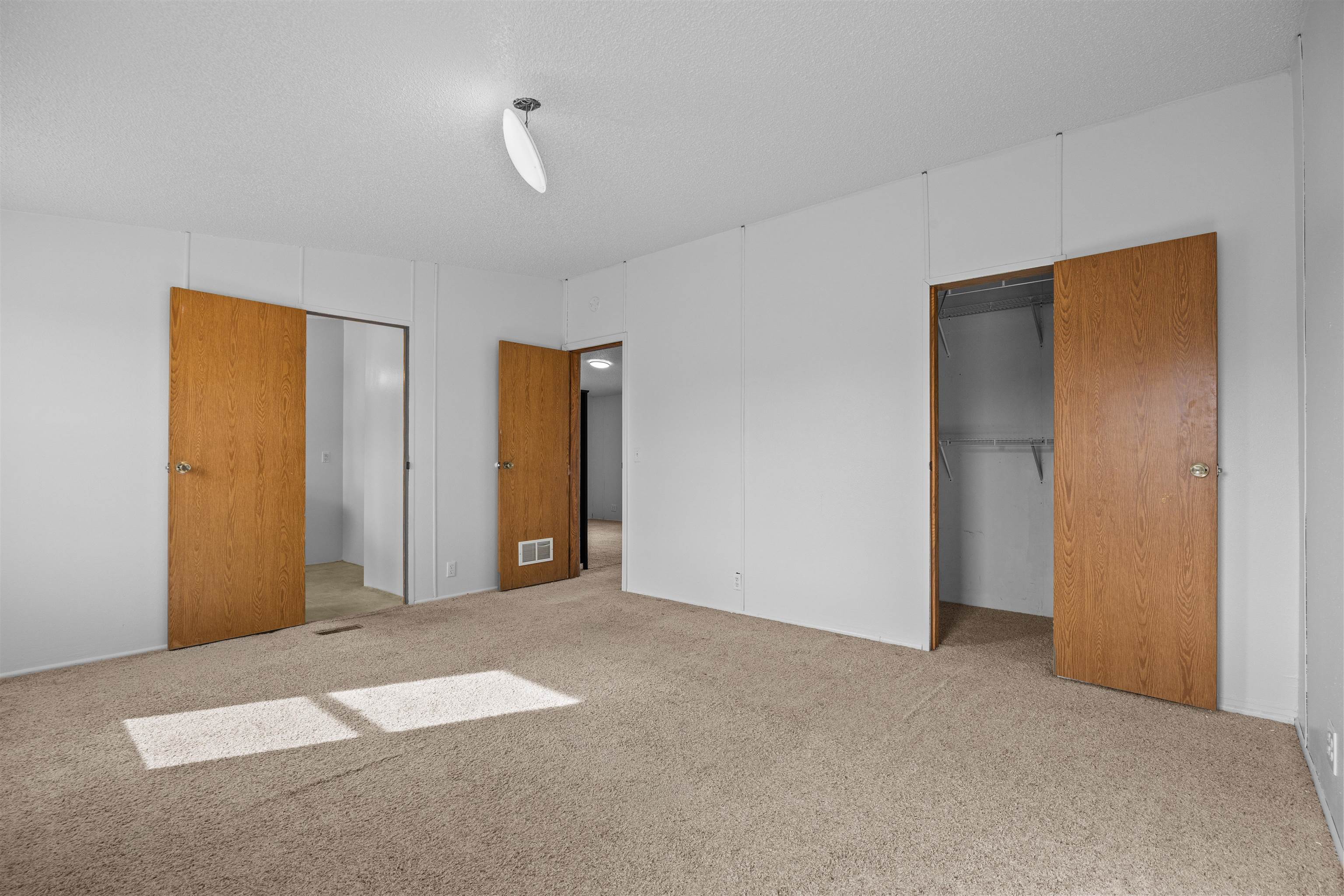 21431 Little Park Road Grand Junction, CO 81507 - Photo 28 of 40 a view of an empty room with a window