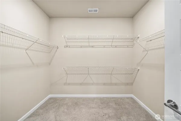 a view of a room with racks on the wall