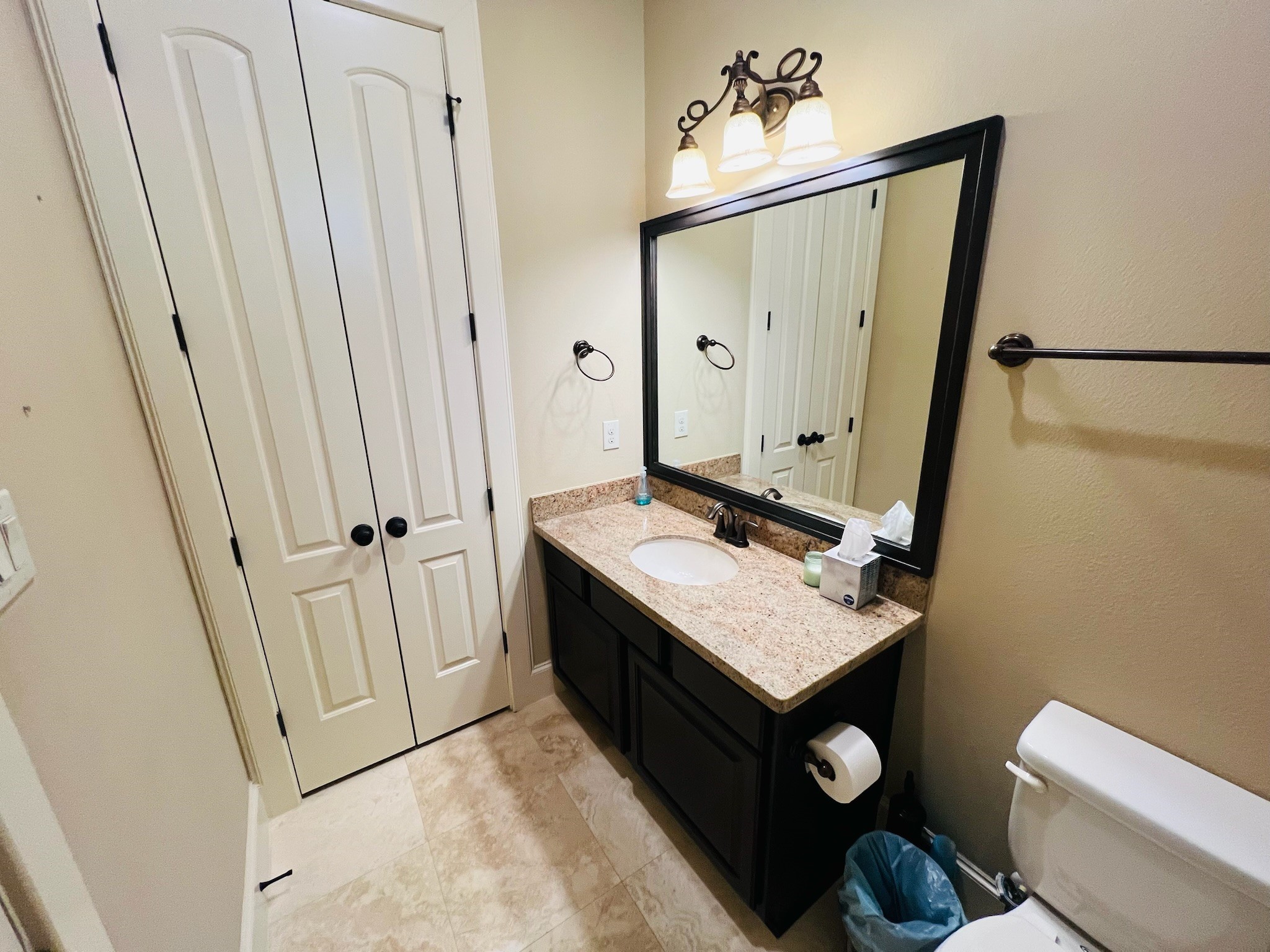4310 Floyd Street, Unit B Houston, TX 77007 - Photo 11 of 44 a bathroom with a sink vanity mirror and toilet