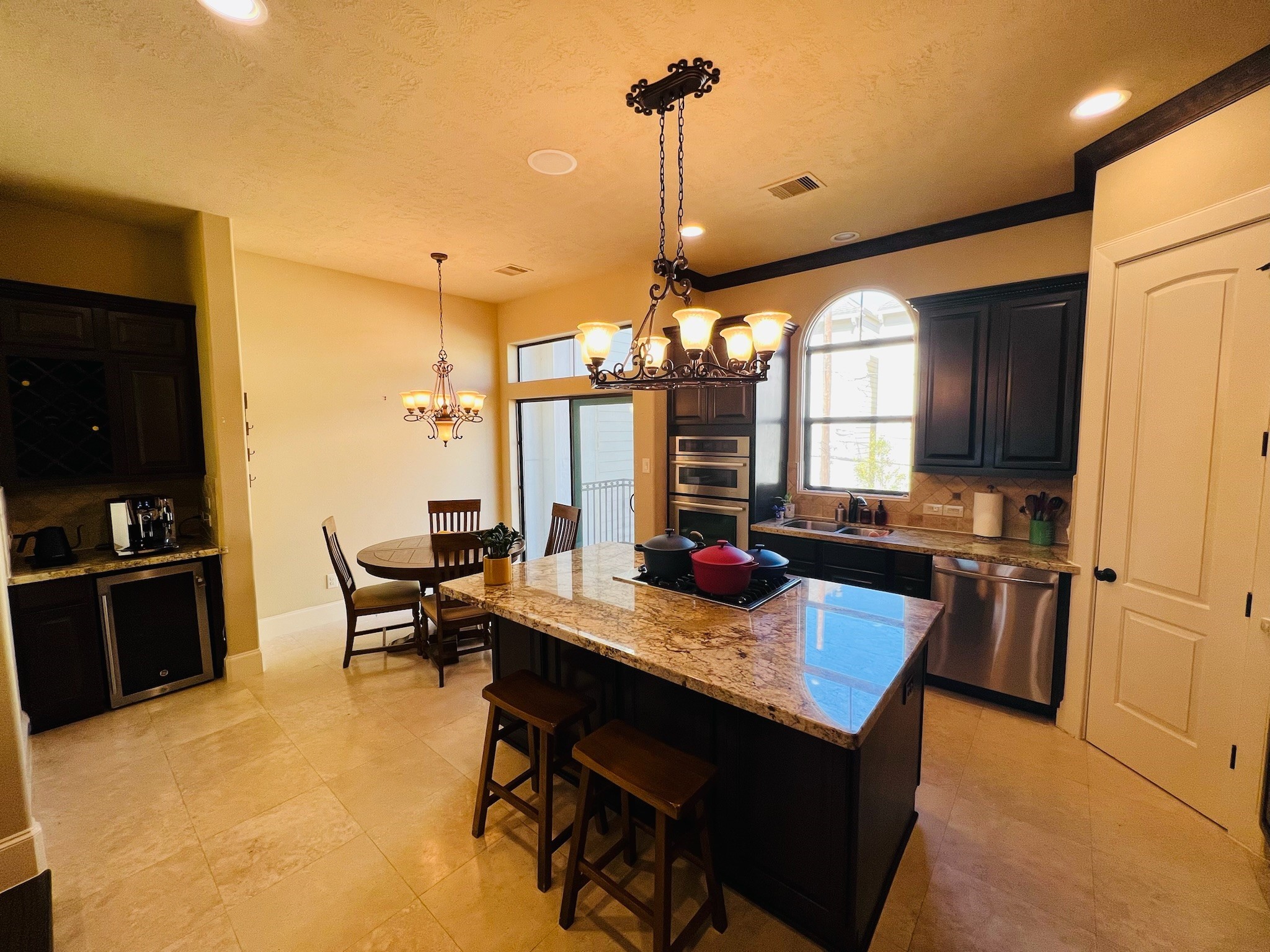 4310 Floyd Street, Unit B Houston, TX 77007 - Photo 17 of 44 a kitchen with a stove a refrigerator and wooden floor