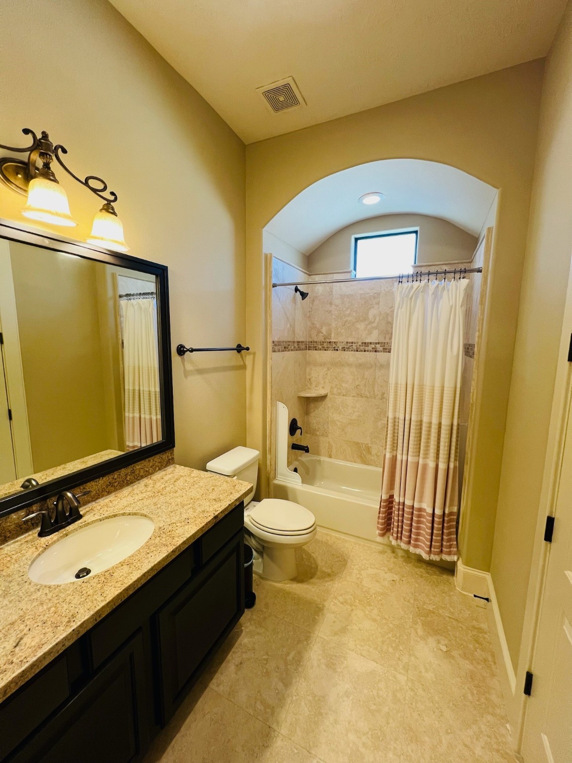 4310 Floyd Street, Unit B Houston, TX 77007 - Photo 36 of 44 a bathroom with a granite countertop sink toilet and shower