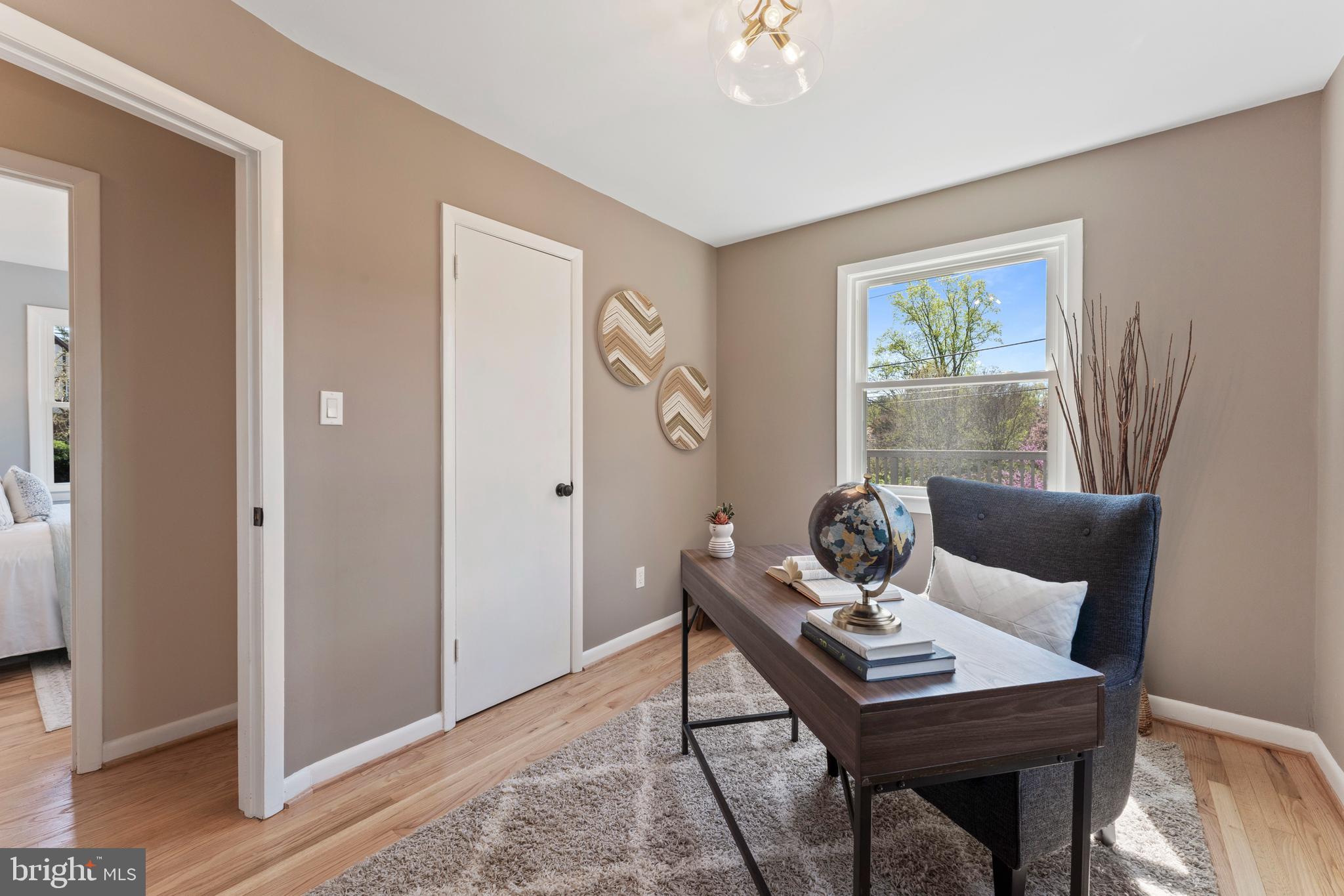3 Melbourne Avenue Silver Spring, MD 20901 - Photo 25 of 80 a living room with furniture and wooden floor