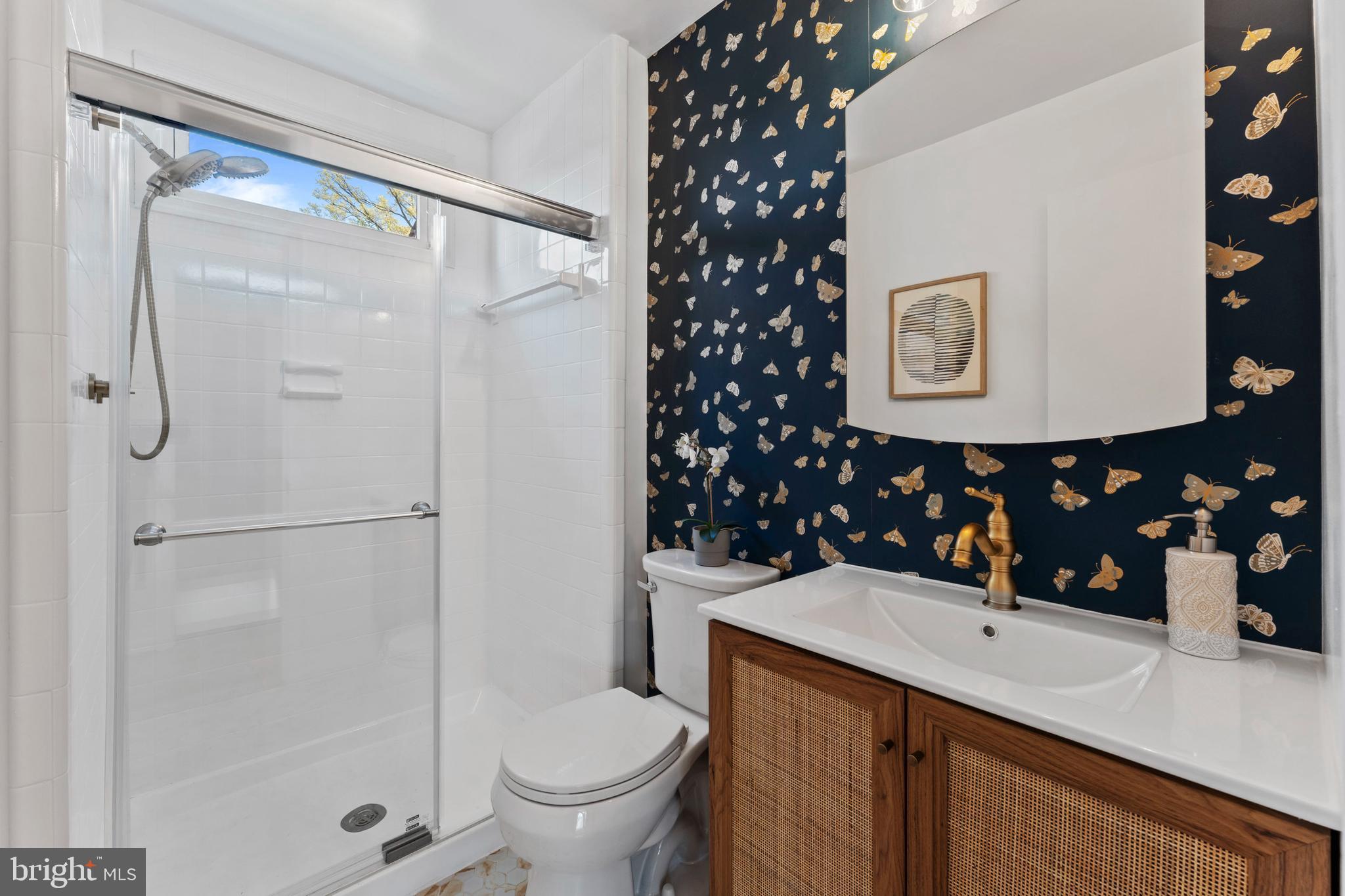 3 Melbourne Avenue Silver Spring, MD 20901 - Photo 29 of 80 a bathroom with a sink toilet and shower