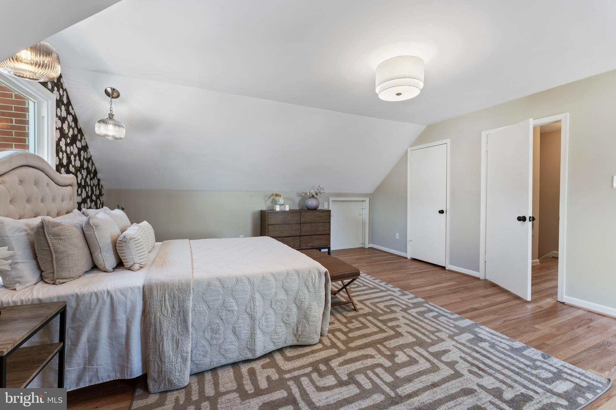 3 Melbourne Avenue Silver Spring, MD 20901 - Photo 35 of 80 a bedroom with a bed and a mirror