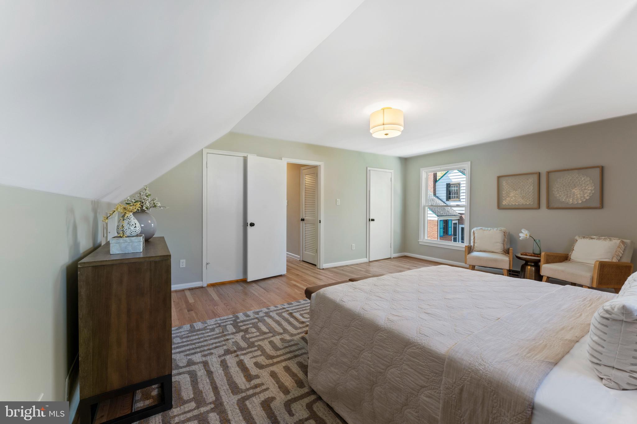 3 Melbourne Avenue Silver Spring, MD 20901 - Photo 36 of 80 a spacious bedroom with a bed and a refrigerator