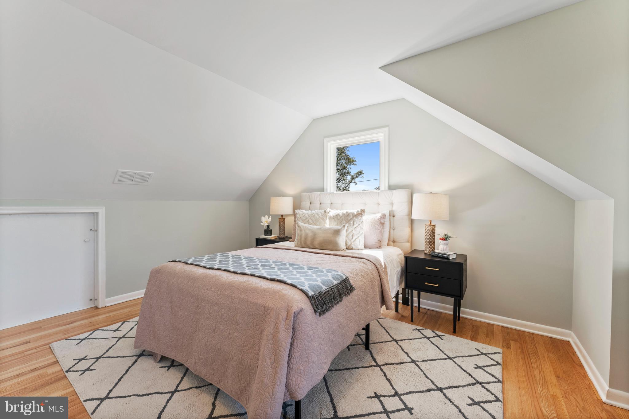 3 Melbourne Avenue Silver Spring, MD 20901 - Photo 39 of 80 a bedroom with a bed and a table