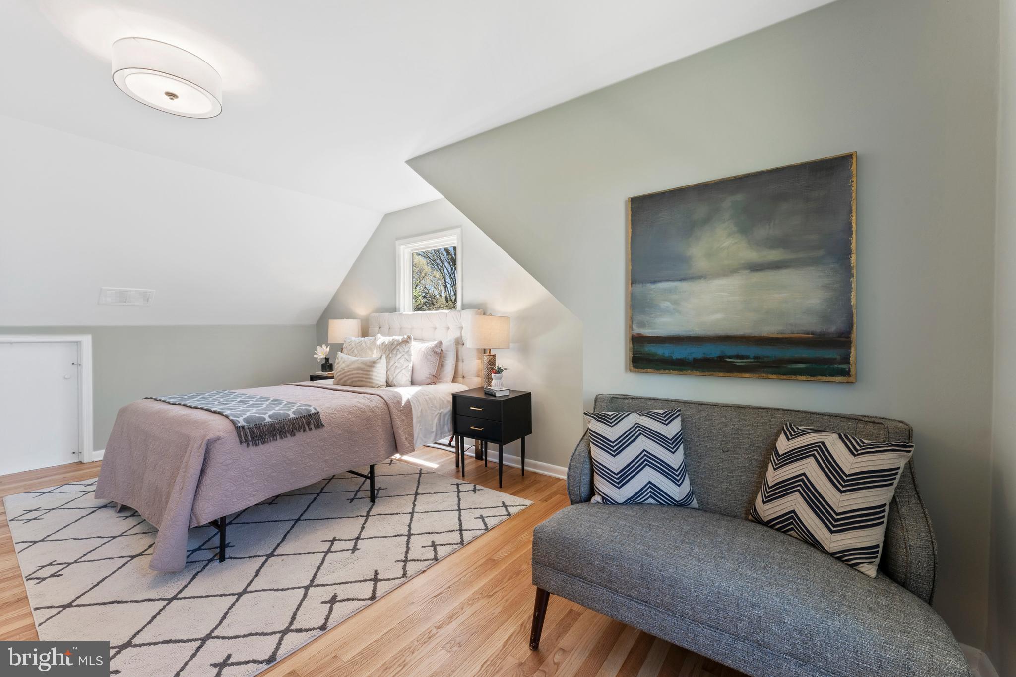 3 Melbourne Avenue Silver Spring, MD 20901 - Photo 40 of 80 a living room with furniture and a flat screen tv