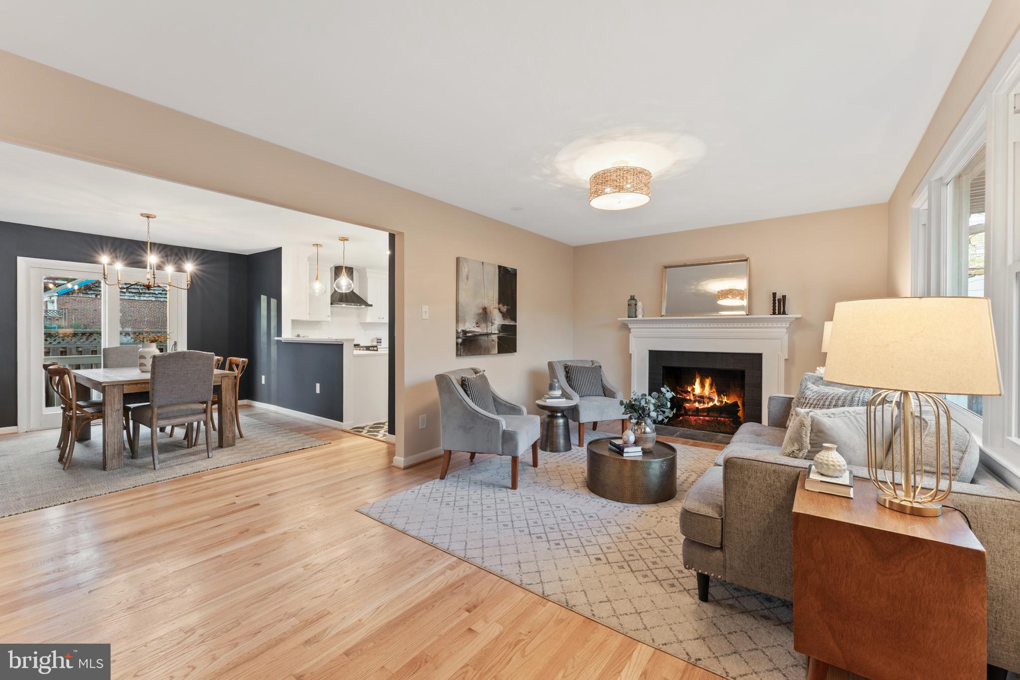 3 Melbourne Avenue Silver Spring, MD 20901 - Photo 4 of 80 a living room with furniture and a fireplace