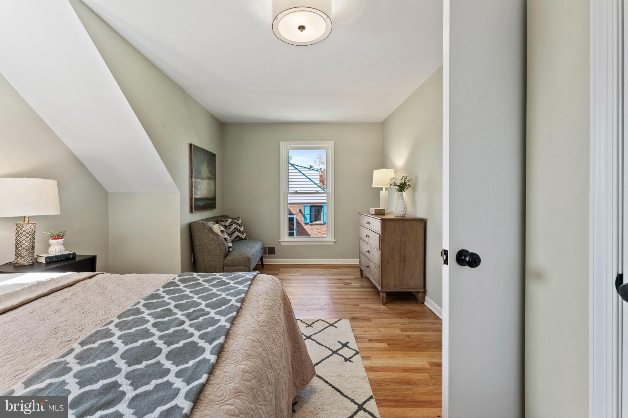 3 Melbourne Avenue Silver Spring, MD 20901 - Photo 44 of 80 a bedroom with a bed and wooden floor