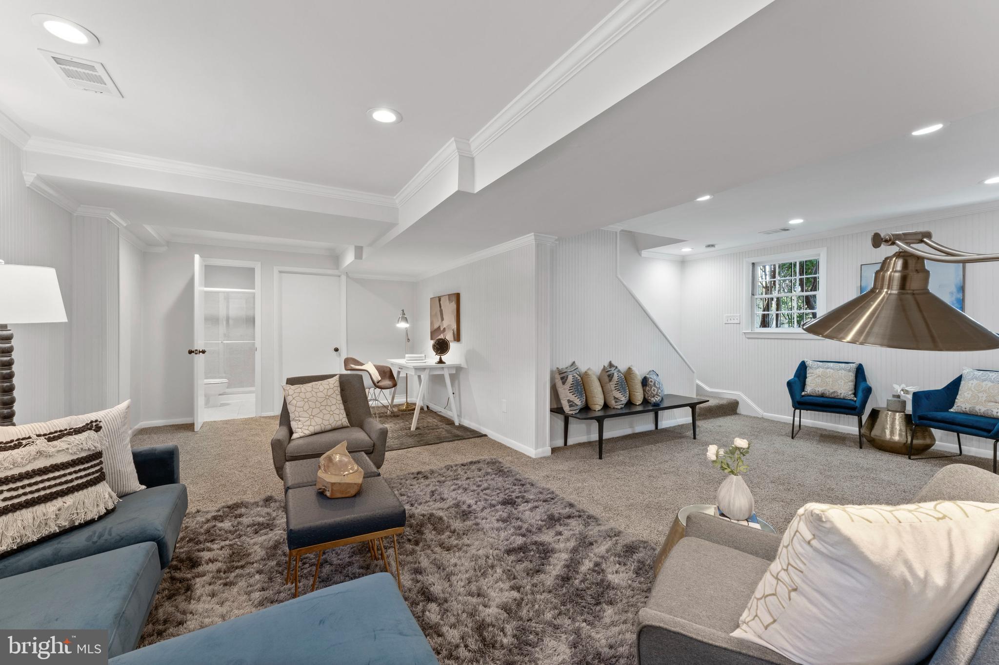 3 Melbourne Avenue Silver Spring, MD 20901 - Photo 50 of 80 a living room with furniture and a wooden floor