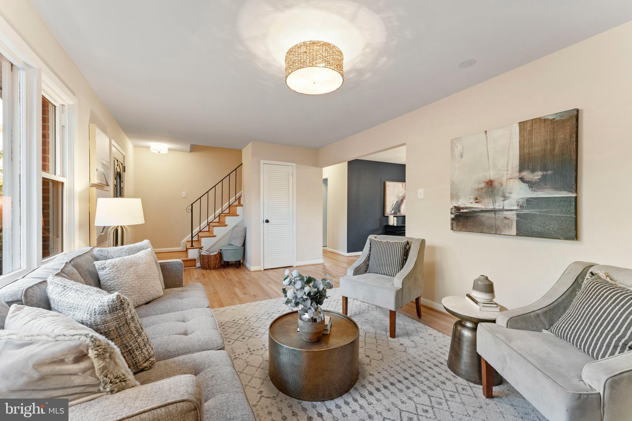 3 Melbourne Avenue Silver Spring, MD 20901 - Photo 5 of 80 a living room with furniture and a large window