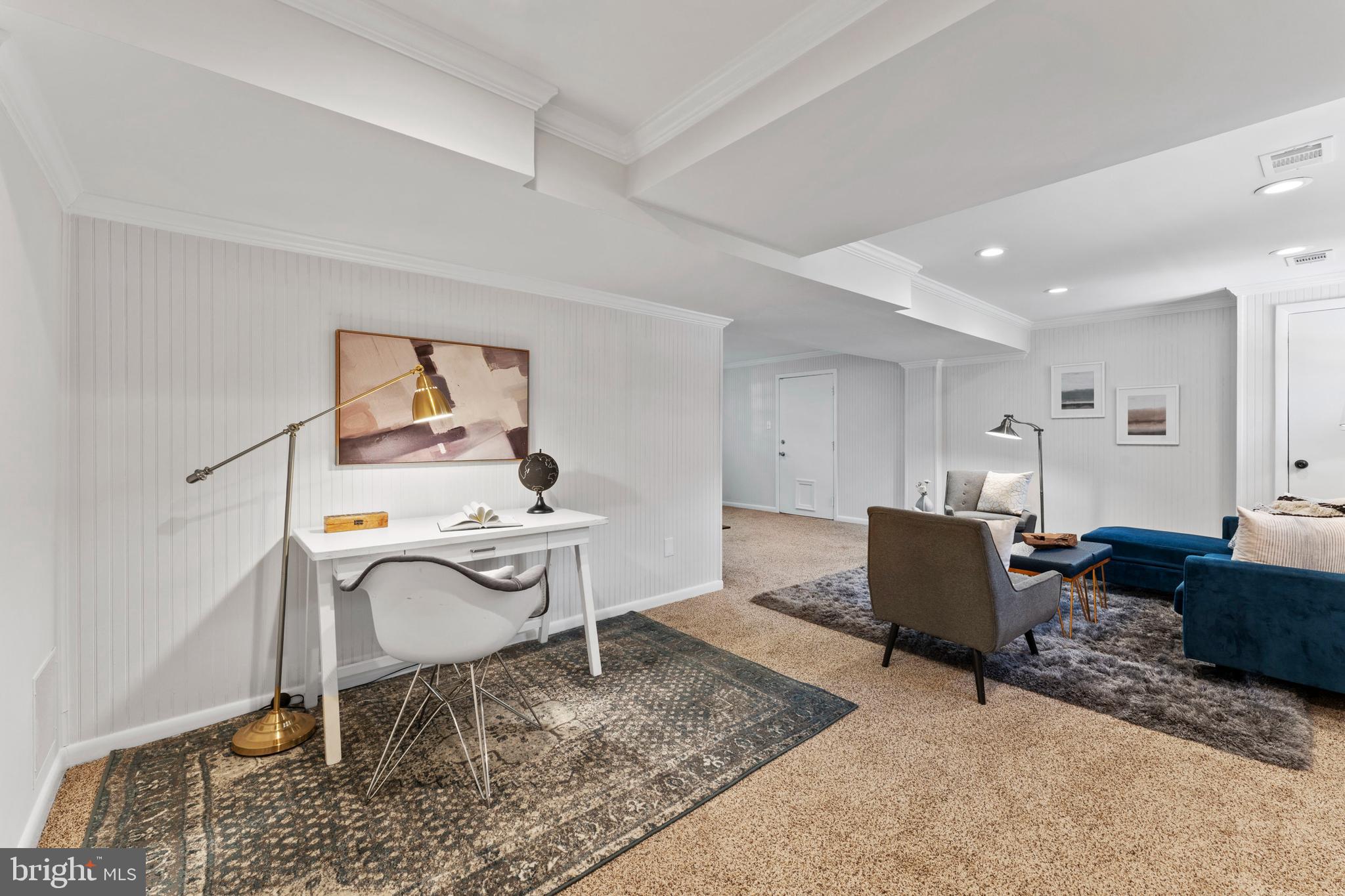 3 Melbourne Avenue Silver Spring, MD 20901 - Photo 52 of 80 a living room with furniture a rug and a table