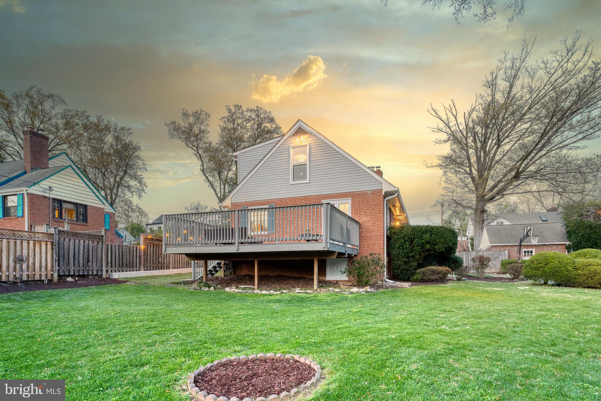 3 Melbourne Avenue Silver Spring, MD 20901 - Photo 65 of 80 a backyard of a house with wooden fence and large trees