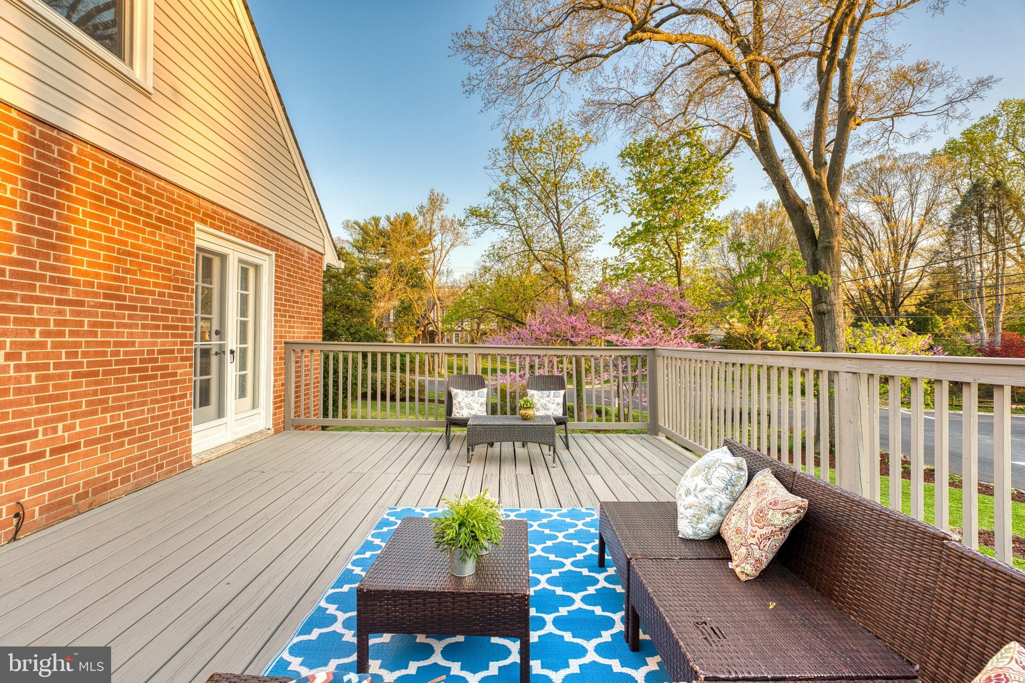 3 Melbourne Avenue Silver Spring, MD 20901 - Photo 80 of 80 a view of a deck with couches table and chairs and wooden floor