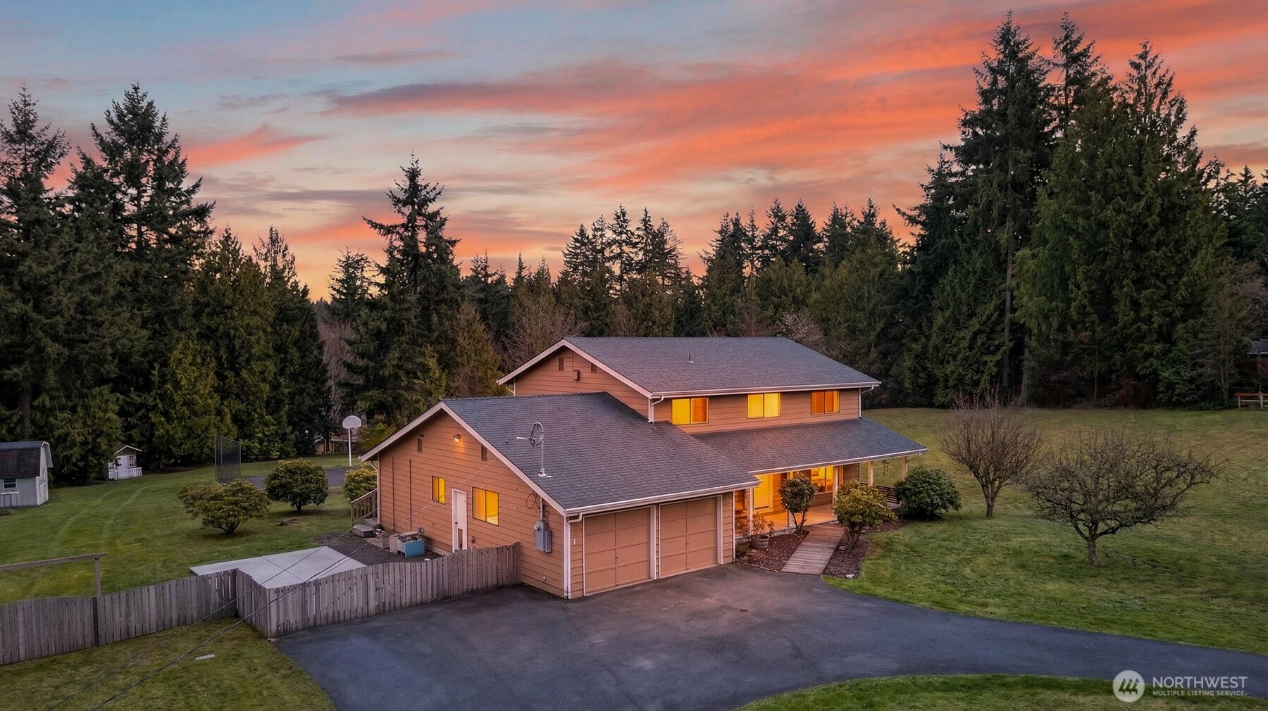 20115 48th Avenue Southeast Bothell, WA 98012 - Photo 1 of 26 a aerial view of a house next to a yard