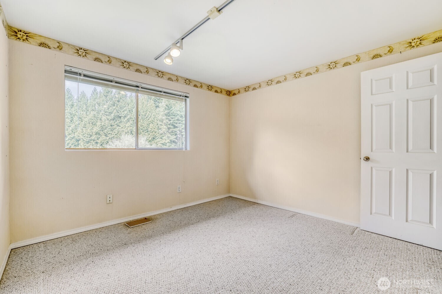 20115 48th Avenue Southeast Bothell, WA 98012 - Photo 18 of 26 a view of an empty room with a window