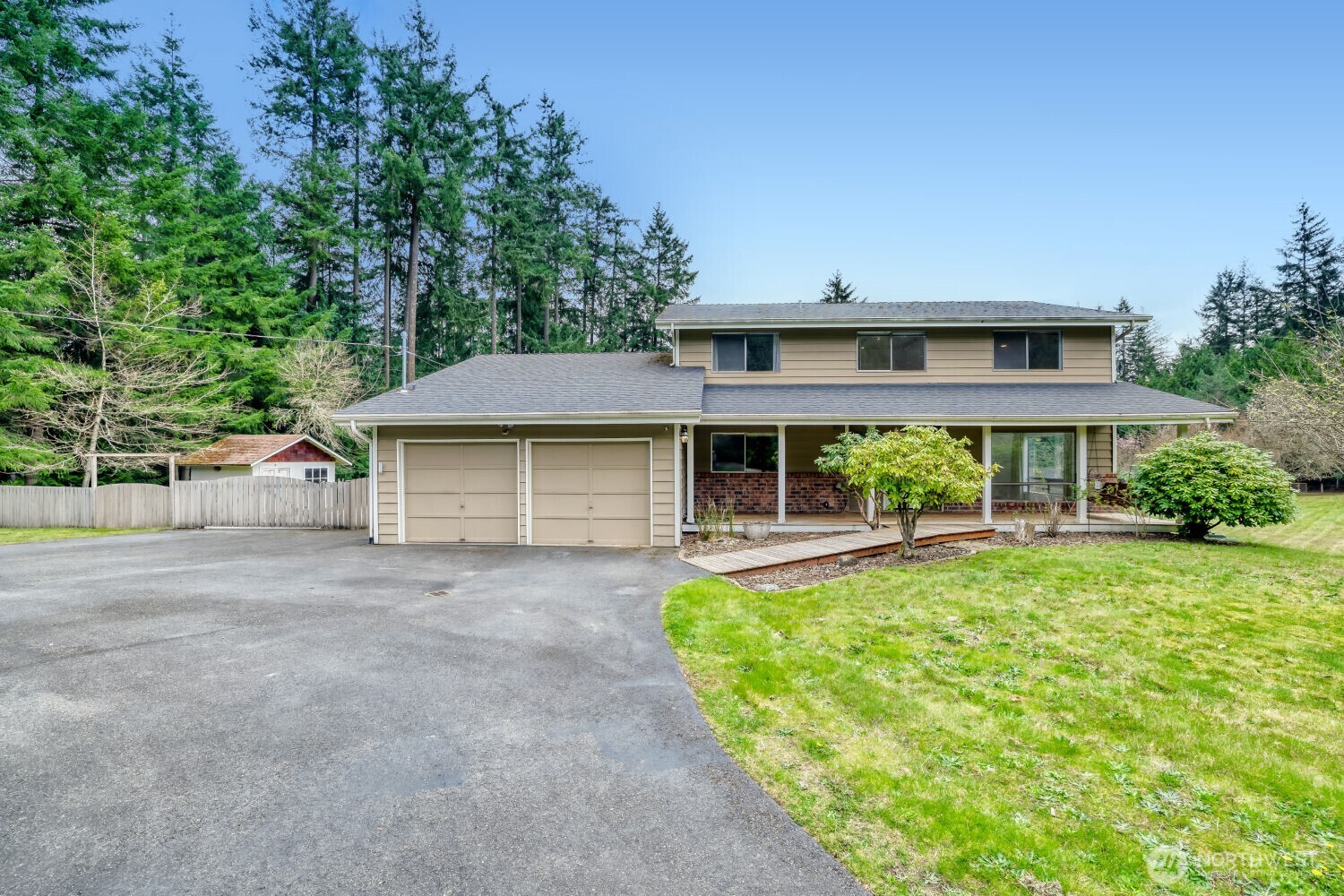 20115 48th Avenue Southeast Bothell, WA 98012 - Photo 2 of 26 front view of a house with a yard