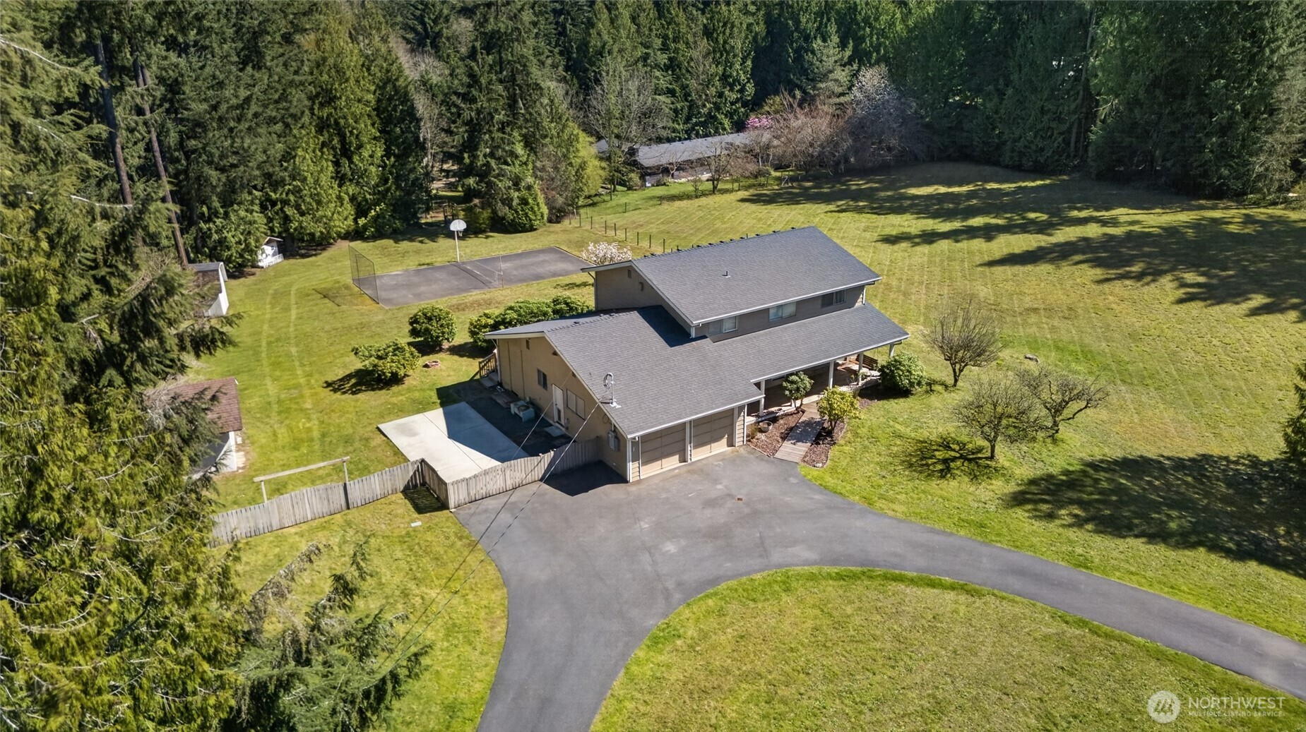 20115 48th Avenue Southeast Bothell, WA 98012 - Photo 26 of 26 an aerial view of a house with swimming pool and a yard