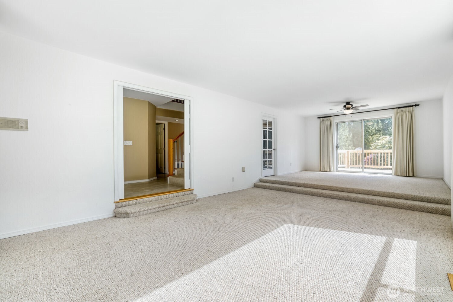 20115 48th Avenue Southeast Bothell, WA 98012 - Photo 4 of 26 a view of an empty room with a window