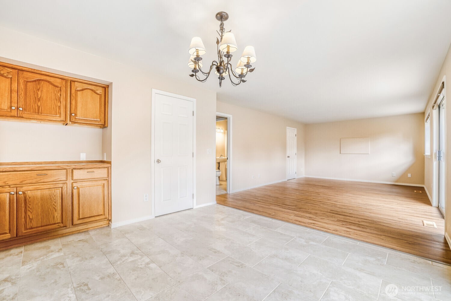 20115 48th Avenue Southeast Bothell, WA 98012 - Photo 6 of 26 a view of a livingroom with a chandelier