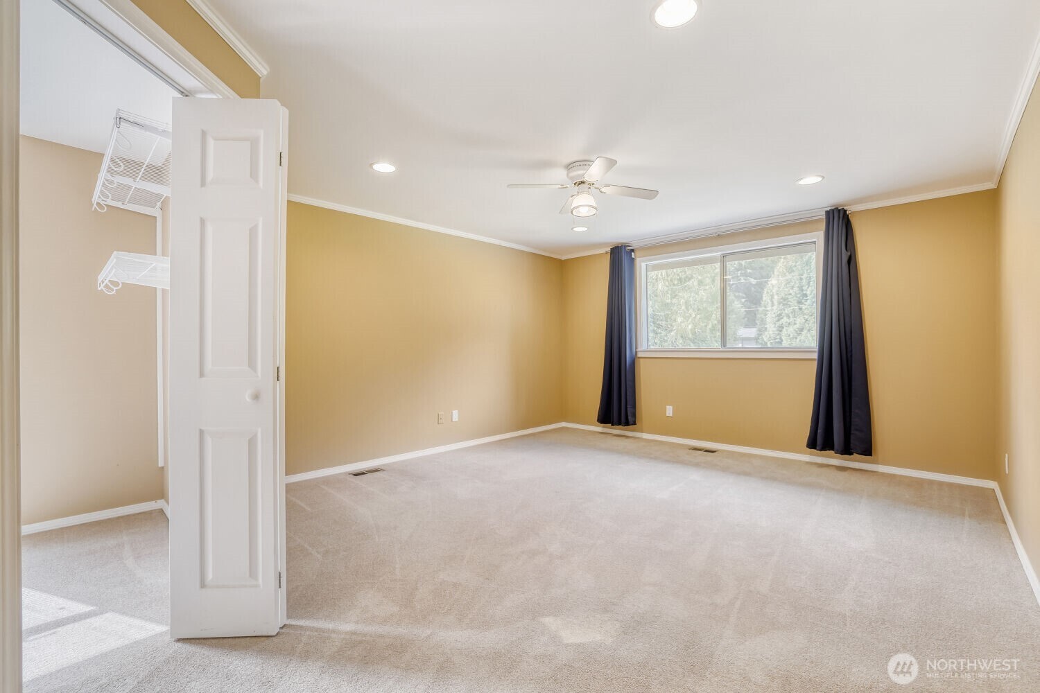 20115 48th Avenue Southeast Bothell, WA 98012 - Photo 10 of 26 a view of an empty room with a window