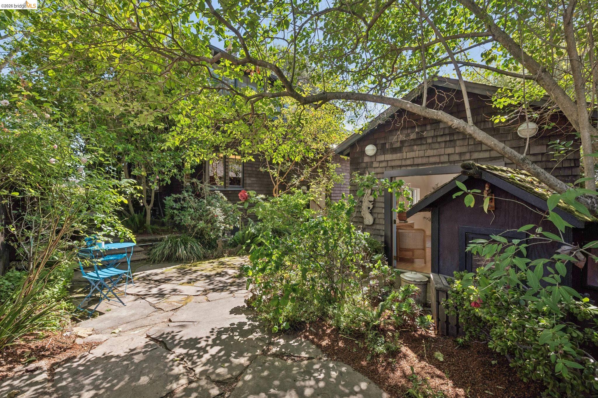 1490 Arch Street Berkeley, CA 94708 - Photo 41 of 57 a view of a house with a yard