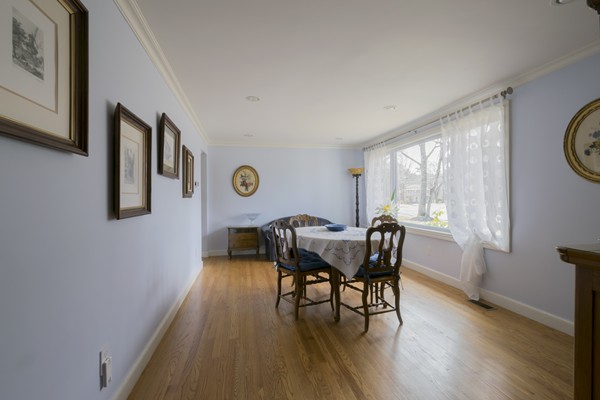 26 Cider Mill Road Framingham, MA 01701 - Photo 4 of 30 a view of a dining room with furniture and wooden floor