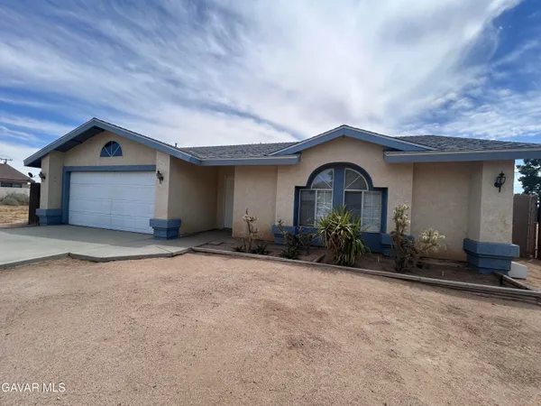 a view of a house with a patio