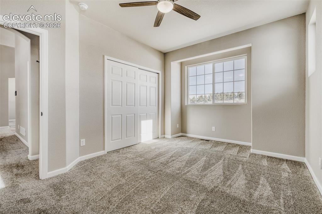 13680 Woodlake Road Elbert, CO 80106 - Photo 26 of 46 Secondary Bedroom #2