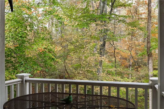 a view of a balcony with an outdoor space