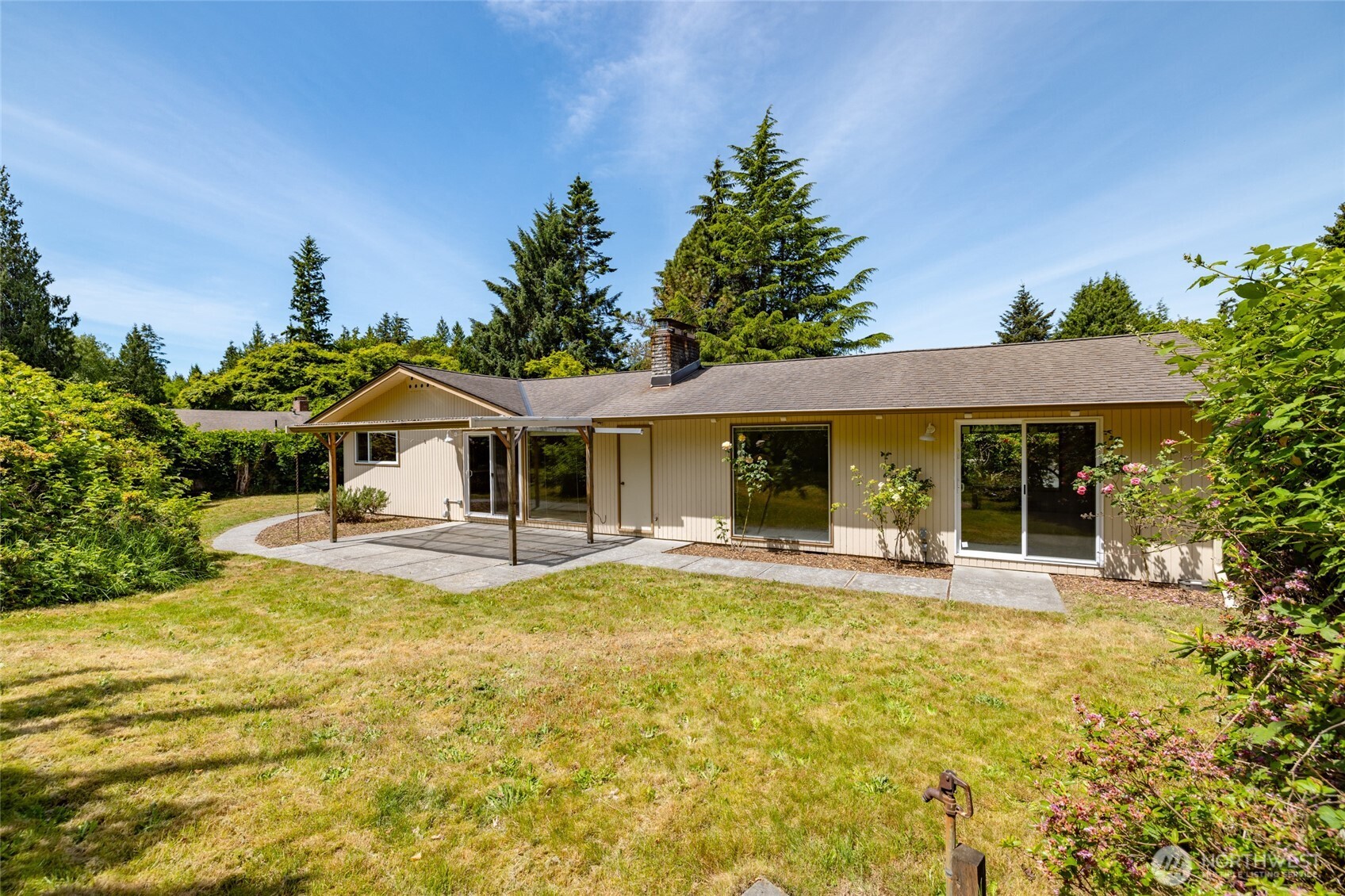 21316 Rolling Ridge Drive Sedro-Woolley, WA 98284 - Photo 27 of 37 a front view of a house with swimming pool