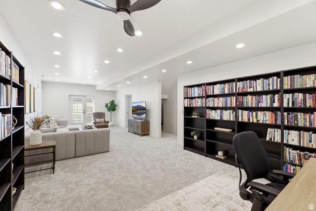1712 Somerset Ridge Drive Draper, UT 84020 - Photo 62 of 76 Spacious room with built-in dark wood-finish bookcases, recessed lighting, and light gray carpet flooring