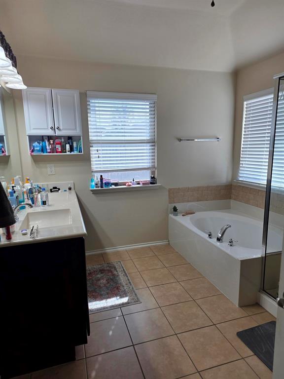 213 Independence Trail Forney, TX 75126 - Photo 8 of 17 a kitchen with a sink cabinets and window