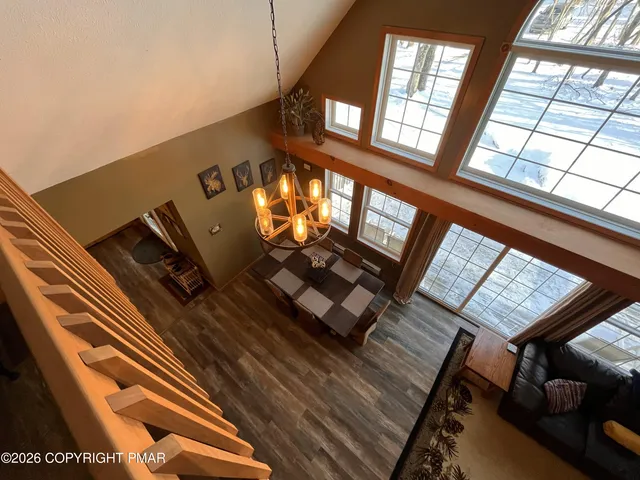 a balcony with view of living room