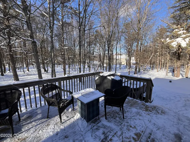 a view of a lounge chairs in the deck