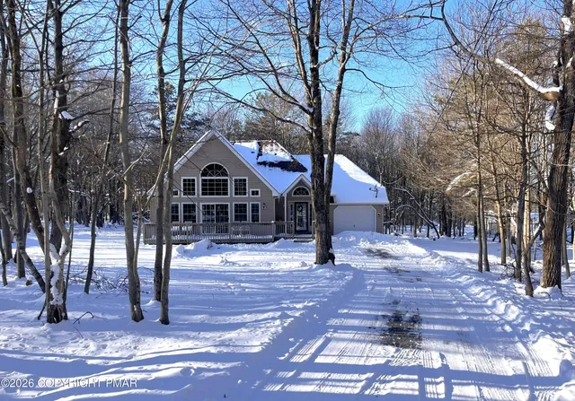 a house with trees in the background