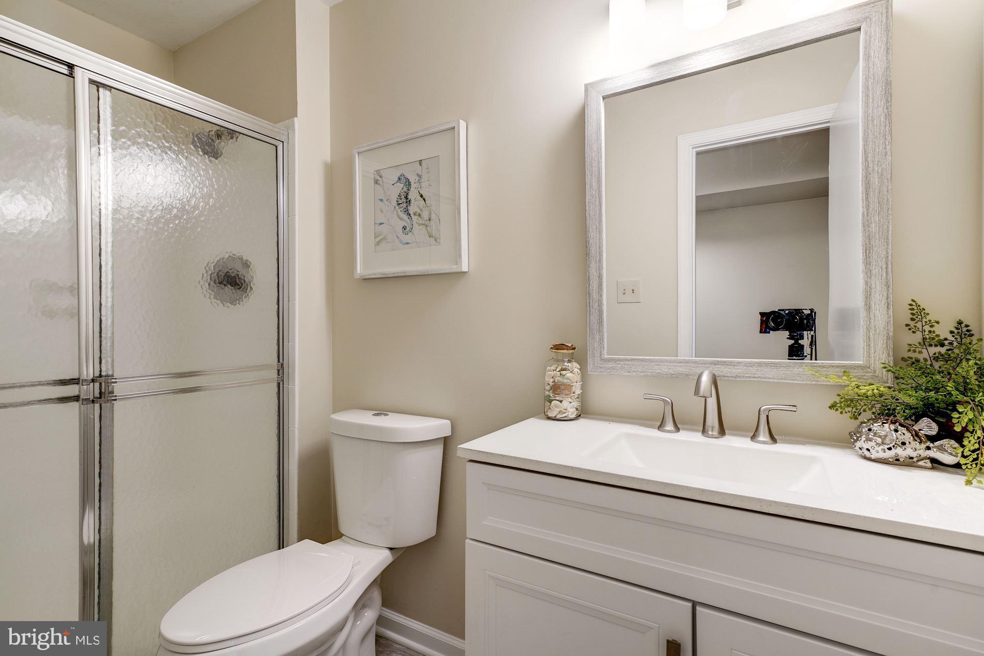 9004 Jones Mill Road Chevy Chase, MD 20815 - Photo 20 of 39 Master bedroom bath with walk-in shower & vanity