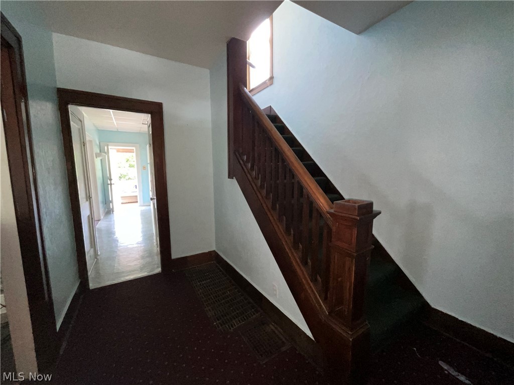 700 Cove Road Weirton, WV 26062 - Photo 4 of 26 Stairs featuring dark tile floors