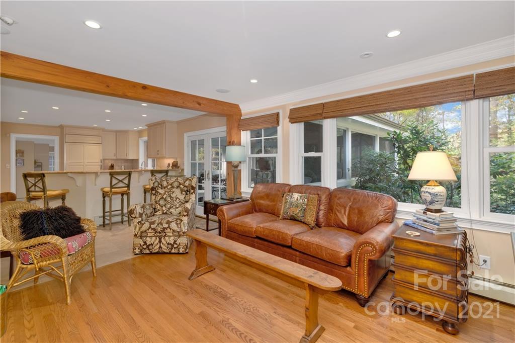 9 Forest Road Biltmore Forest, NC 28803 - Photo 12 of 36 a living room with furniture and a large window