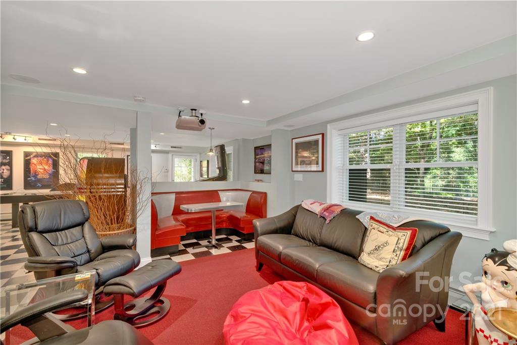 9 Forest Road Biltmore Forest, NC 28803 - Photo 32 of 36 a living room with furniture window and couch