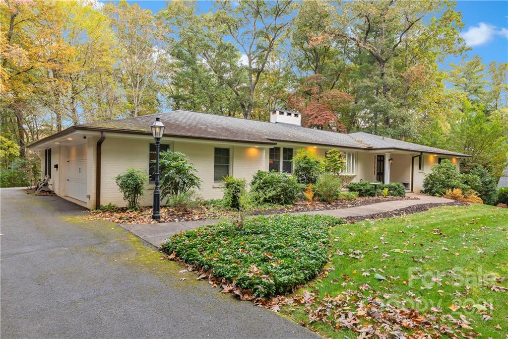 9 Forest Road Biltmore Forest, NC 28803 - Photo 35 of 36 a view of a house with backyard and sitting area