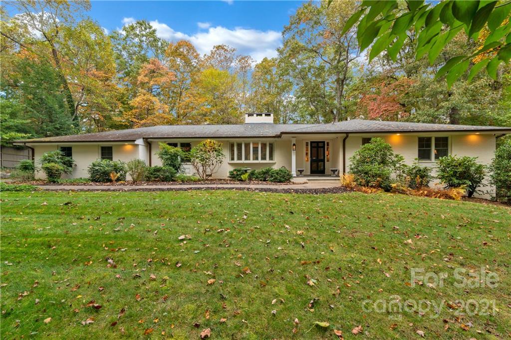9 Forest Road Biltmore Forest, NC 28803 - Photo 36 of 36 a front view of house with yard and green space
