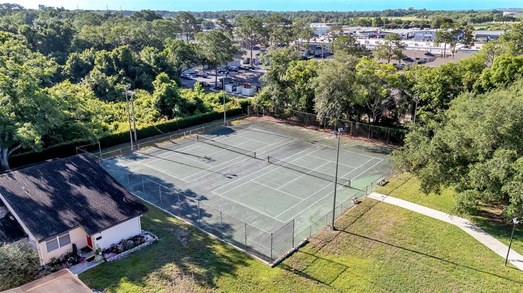 2025 Sylvester Road, Unit N305 Lakeland, FL 33803 - Photo 28 of 34 an aerial view of a house with a yard