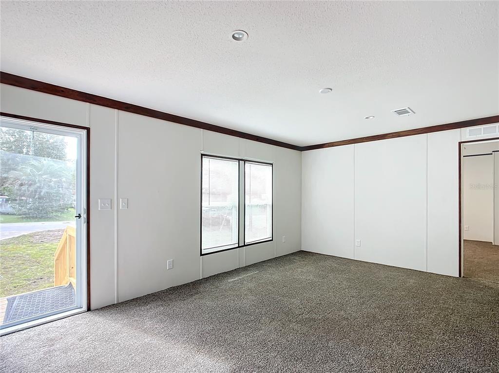 8551 Northwest 125 Street Chiefland, FL 32626 - Photo 15 of 35 an empty room with a window