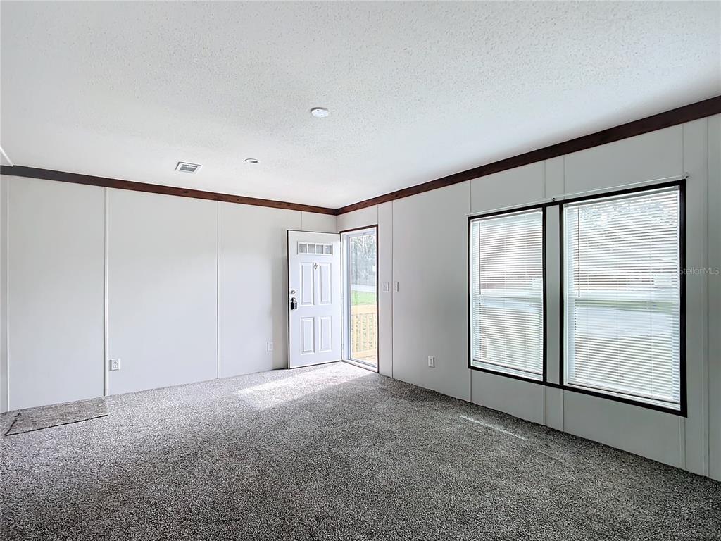8551 Northwest 125 Street Chiefland, FL 32626 - Photo 33 of 35 a view of an empty room with a window