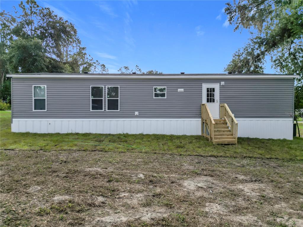 8551 Northwest 125 Street Chiefland, FL 32626 - Photo 35 of 35 a view of house with backyard