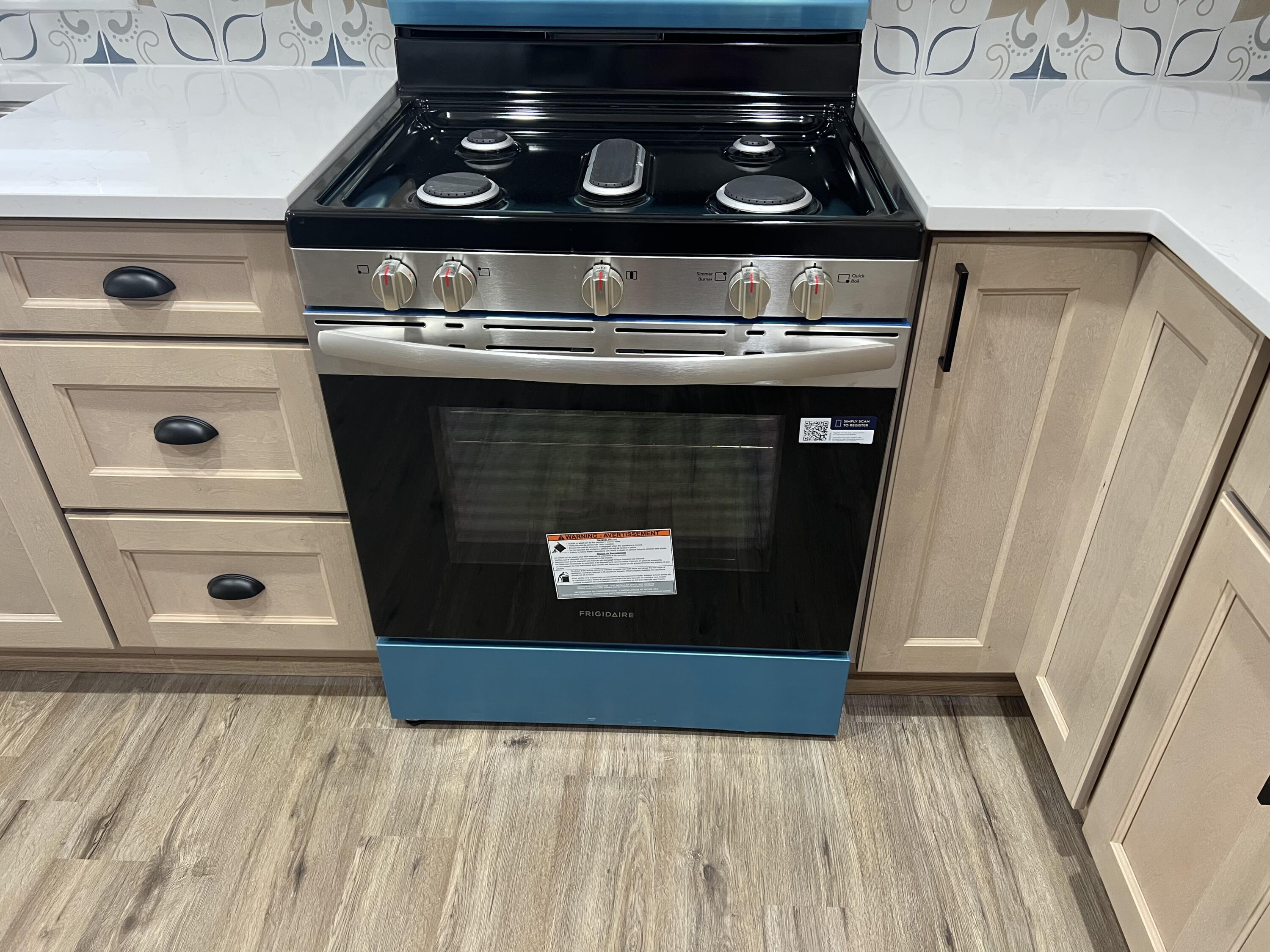 3851 Maple Street Hobart, IN 46342 - Photo 23 of 28 a close view of stove top oven