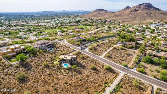an aerial view of residential house with parking space