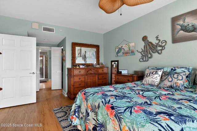 a bathroom with a granite countertop toilet sink and shower